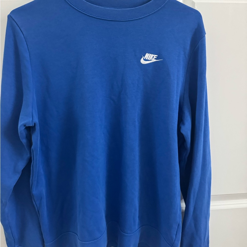 Blue Nike crewneck in medium